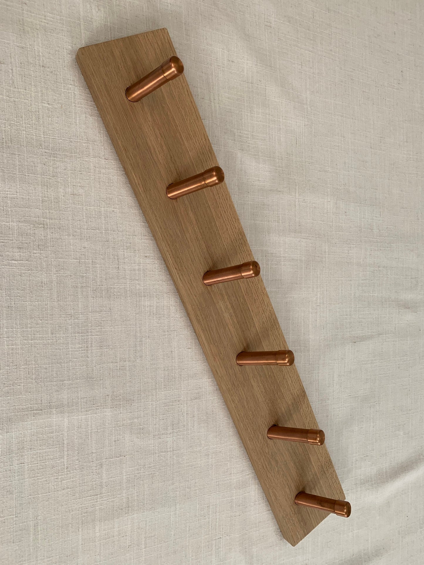 Oak coat hook peg rail with Copper pegs