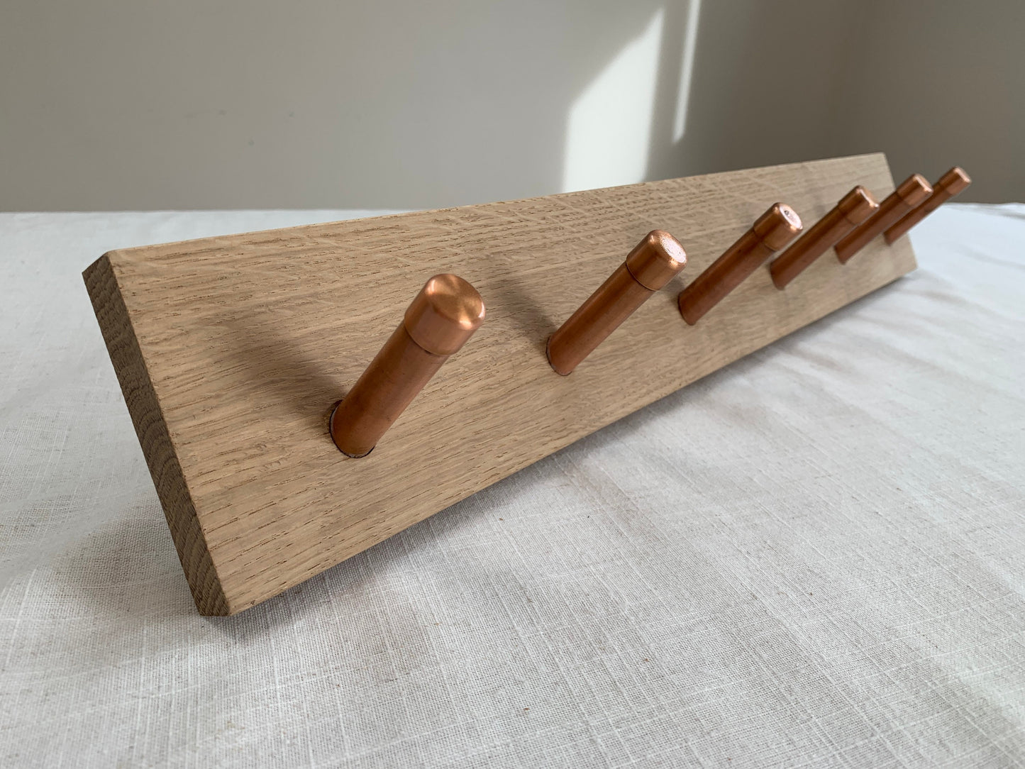 Oak coat hook peg rail with Copper pegs